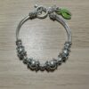 Silver  Fob bracelet with lime ribbon - Image 2